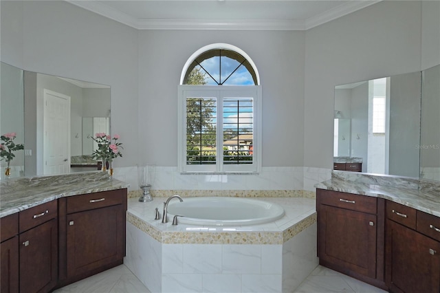 bathroom with plenty of natural light, a relaxing tiled tub, ornamental molding, and vanity