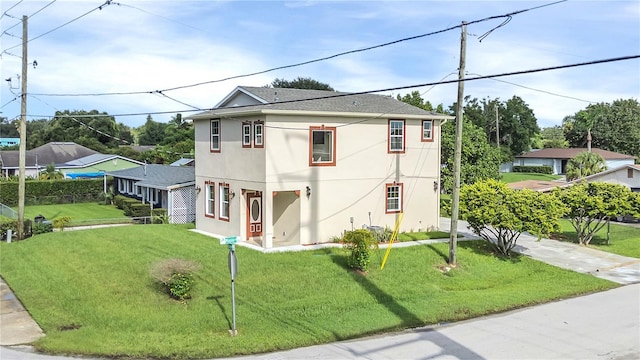 view of front of home with a front yard