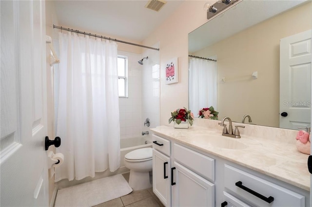 full bathroom featuring tile patterned floors, shower / bathtub combination with curtain, toilet, and vanity