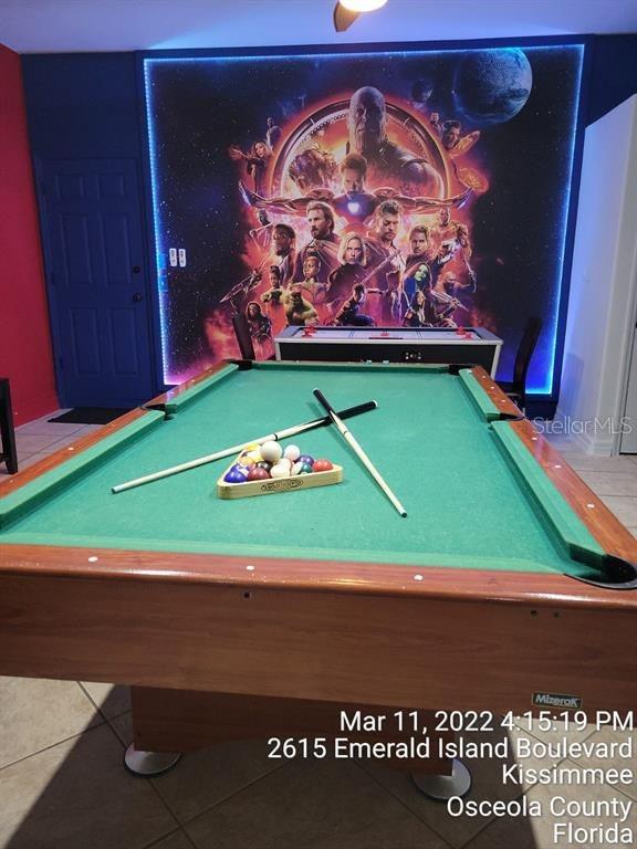 game room with tile patterned floors and pool table