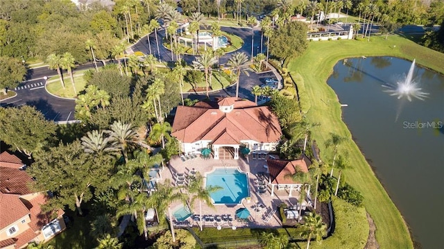 birds eye view of property featuring a water view