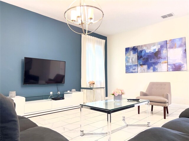 living room with an inviting chandelier