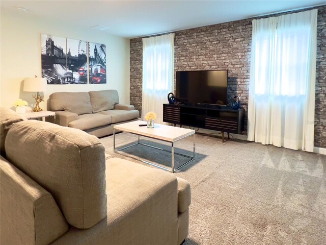 carpeted living room featuring a wealth of natural light