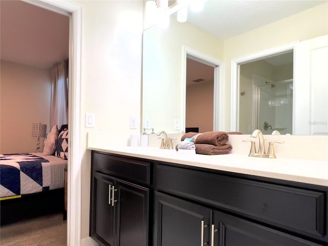 791 Pebble Beach Dr, Davenport, FL 33896 - bathroom featuring a sink, connected bathroom, and a shower stall