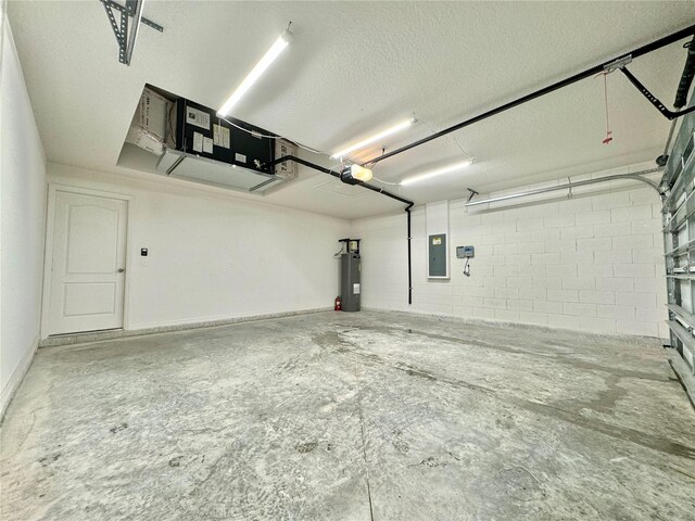 garage with a garage door opener, electric panel, and water heater