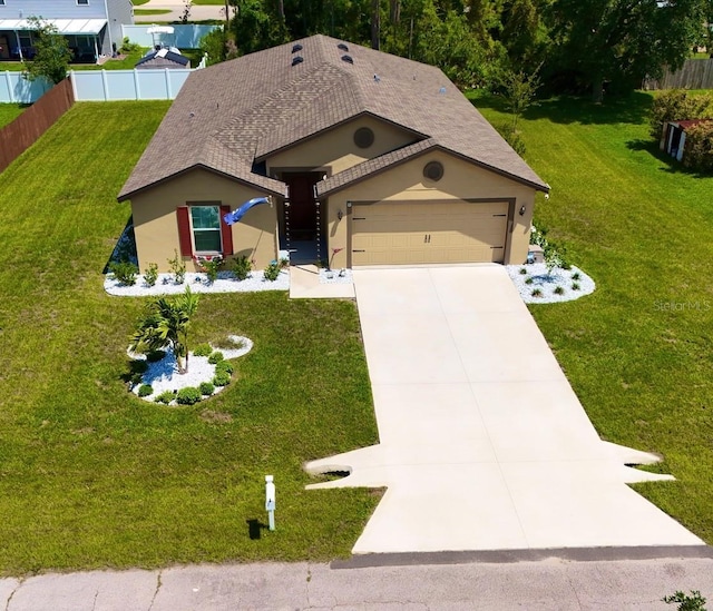 8 Slipper Flower Path E, Palm Coast, FL 32164 - view of front facade with stucco siding, an attached garage, and driveway