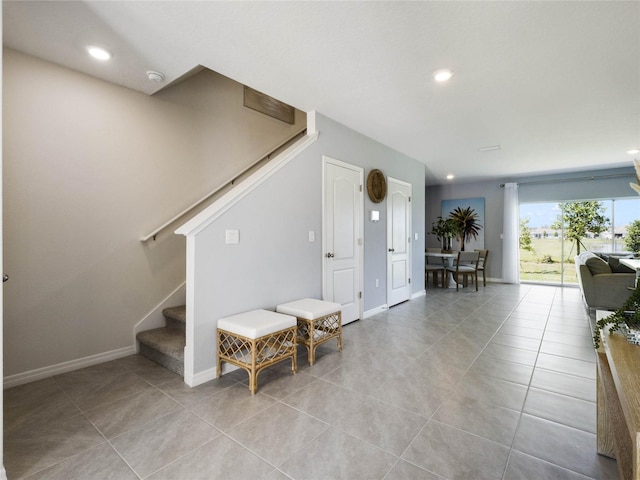 interior space with tile patterned floors