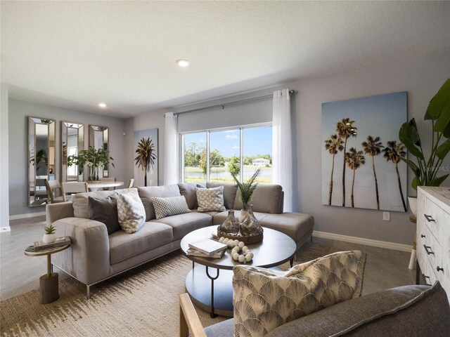 living room featuring a textured ceiling