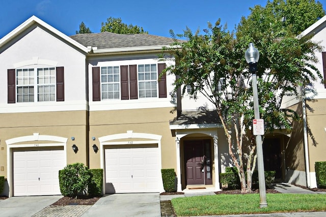 view of property featuring a garage