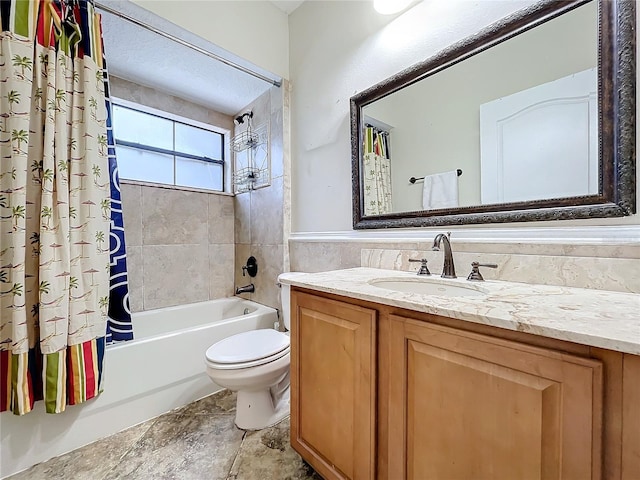 full bathroom featuring shower / bathtub combination with curtain, tile walls, vanity, and toilet