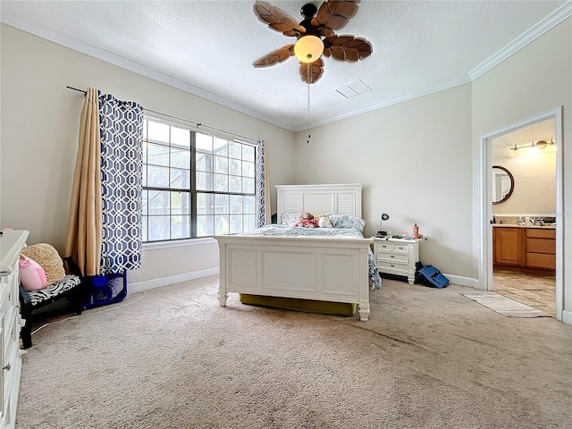 bedroom with ceiling fan, ornamental molding, a textured ceiling, light colored carpet, and ensuite bathroom