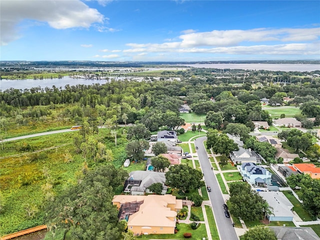 drone / aerial view with a water view