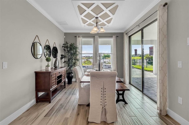 dining space featuring ornamental molding, coffered ceiling, light wood-style flooring, and baseboards