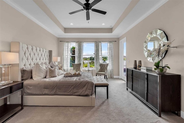 bedroom with a tray ceiling, light colored carpet, ornamental molding, access to outside, and baseboards