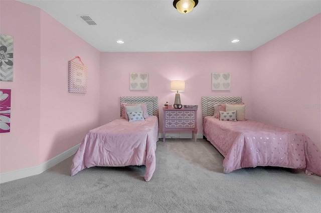 carpeted bedroom with recessed lighting, visible vents, and baseboards