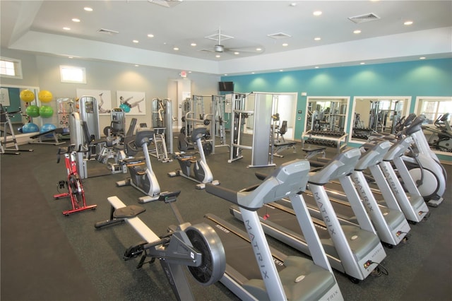 exercise room with ceiling fan, visible vents, and recessed lighting