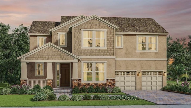 view of front of home with a garage