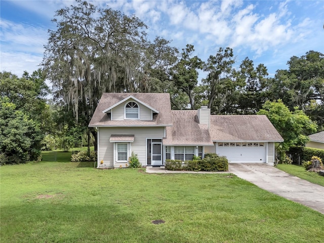 view of front of home featuring a front lawn and a garage