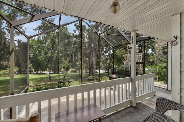 unfurnished sunroom featuring a healthy amount of sunlight