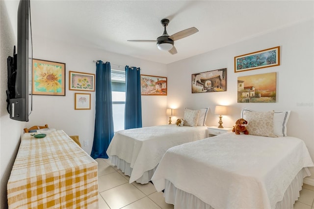 bedroom with light tile patterned floors and ceiling fan