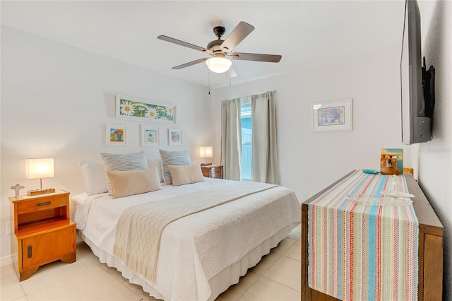 tiled bedroom with ceiling fan