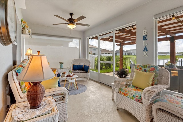 sunroom / solarium with ceiling fan