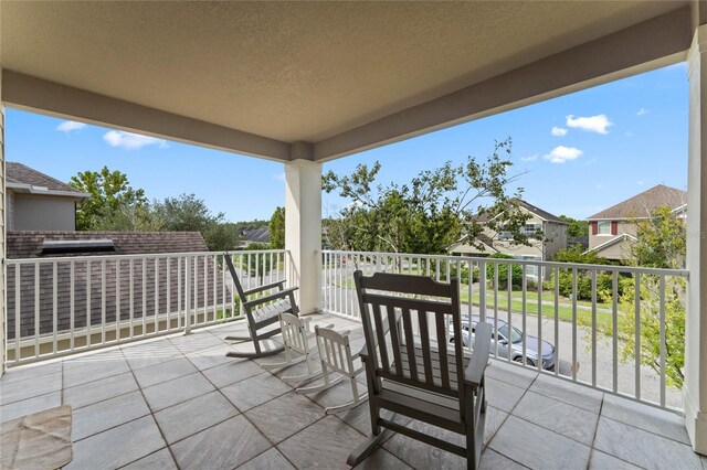 view of patio / terrace with a balcony