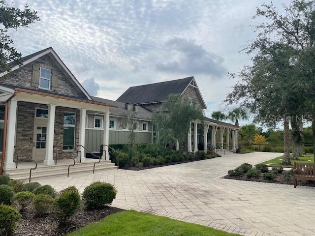 back of property featuring a patio