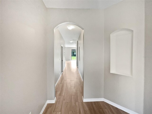 hall with light wood-type flooring