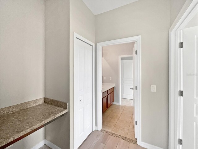 interior space featuring light tile patterned floors