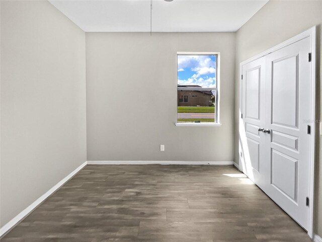 interior space with dark wood-type flooring