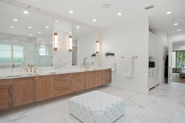 bathroom featuring vanity and plenty of natural light