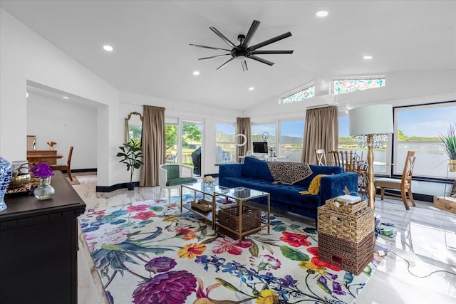 living room with lofted ceiling and ceiling fan