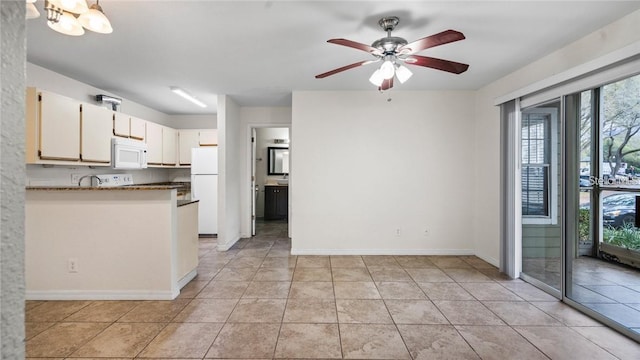 kitchen featuring white cabinetry, white appliances, a wealth of natural light, and ceiling fan