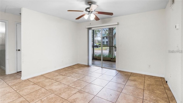 unfurnished room featuring light tile patterned floors and ceiling fan