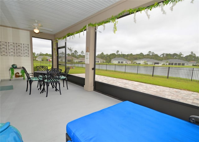 view of patio featuring ceiling fan