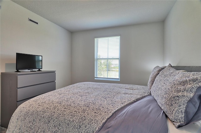 bedroom with a textured ceiling