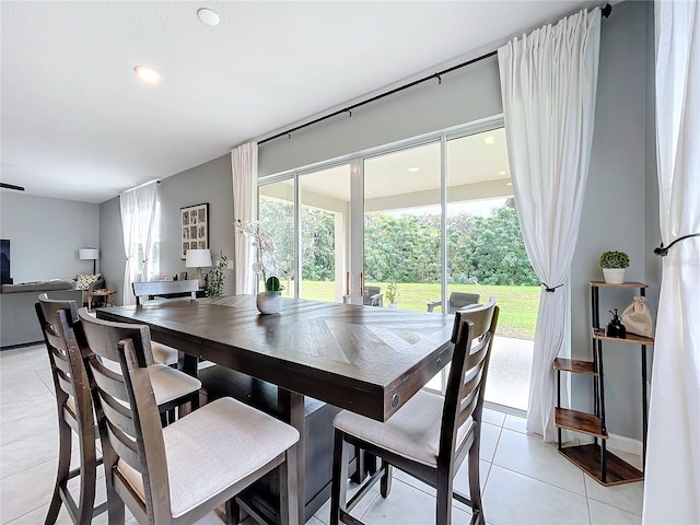 dining room featuring light tile patterned floors