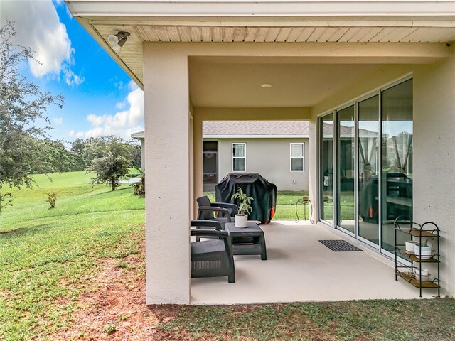 8060 Cherrystone St, Leesburg, FL 34748 - view of patio / terrace with a grill