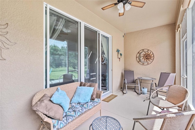 exterior space with a patio area and ceiling fan