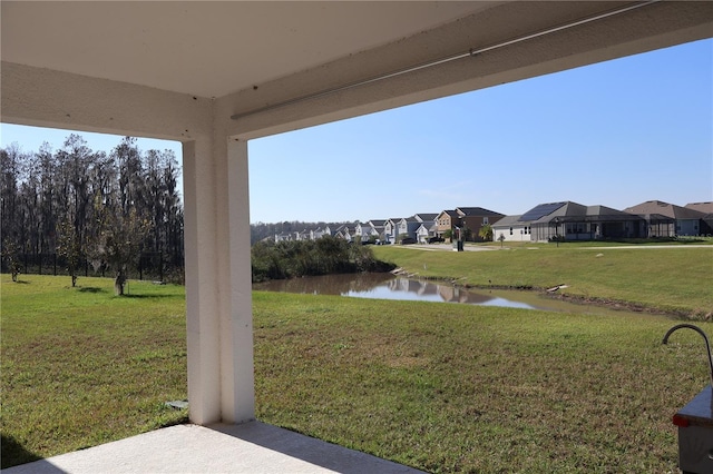 view of yard with a water view