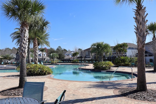 view of swimming pool featuring a patio