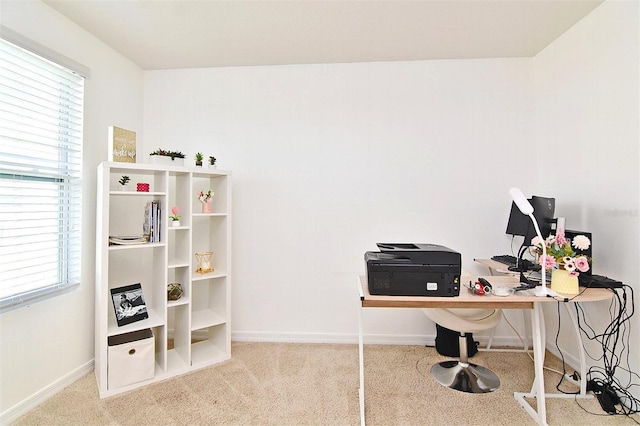 office featuring carpet floors and plenty of natural light