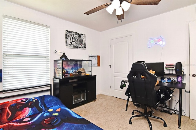 bedroom with light colored carpet and ceiling fan