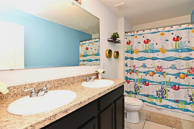 bathroom featuring tile patterned flooring, vanity, toilet, and a shower with curtain