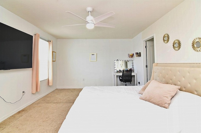 bedroom with light carpet and ceiling fan