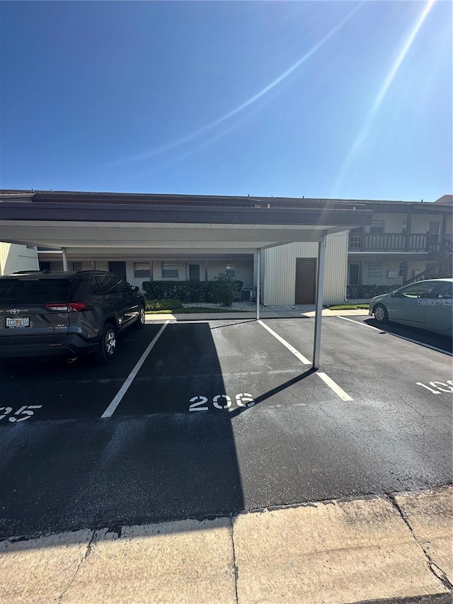 view of car parking with a carport