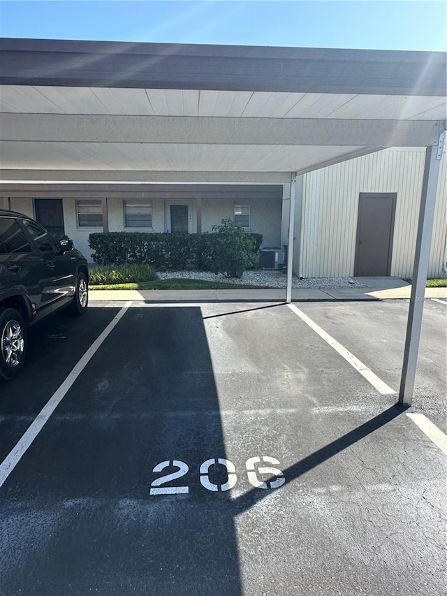 view of car parking featuring a carport