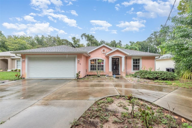 single story home with a garage