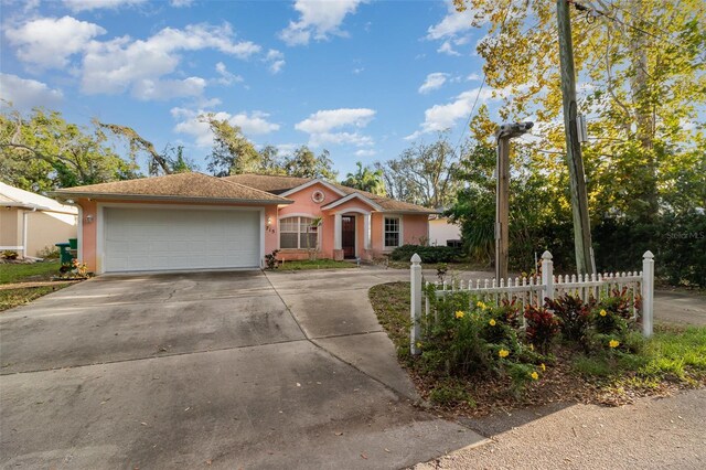 715 Unabelle Ave, Daytona Beach, FL 32117 - ranch-style home with a garage